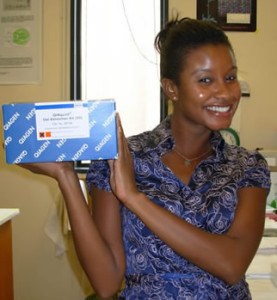 Photo of Kristy holding a box