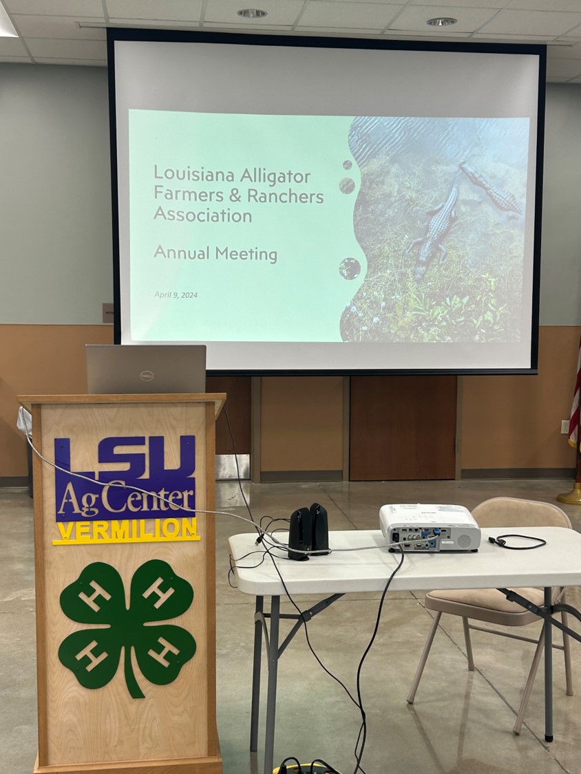 slides show presentation behind LSU AgCenter podium