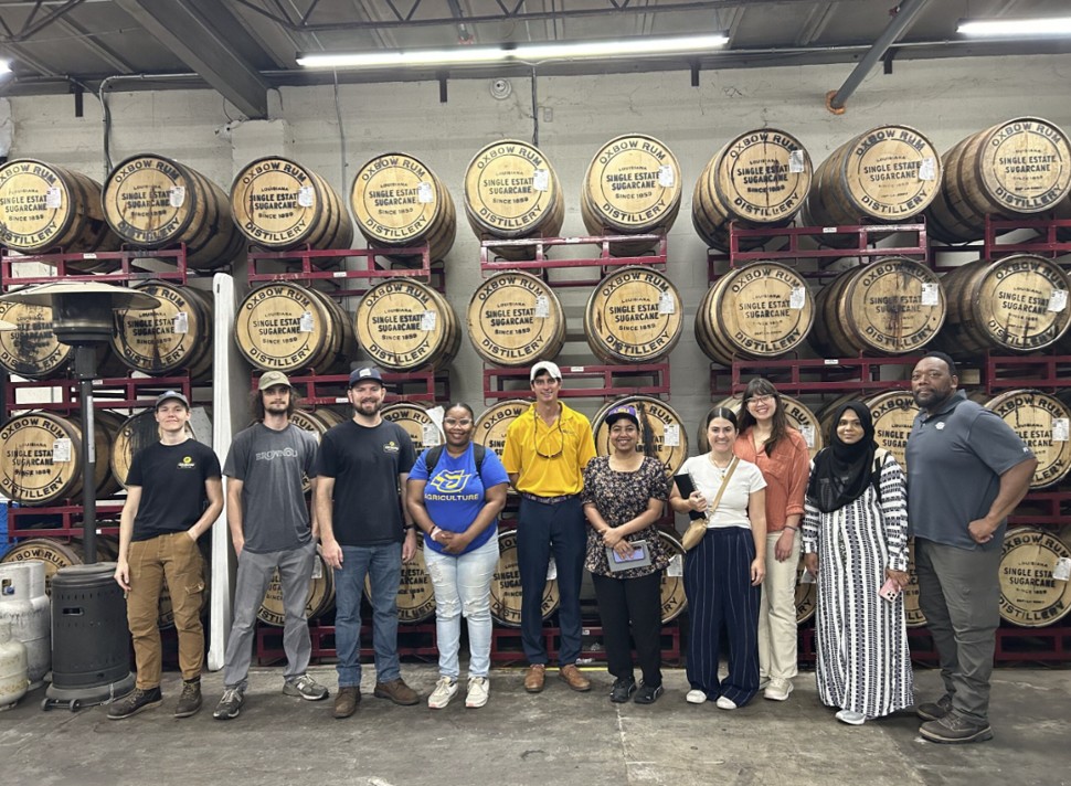 team picture at rum distillery