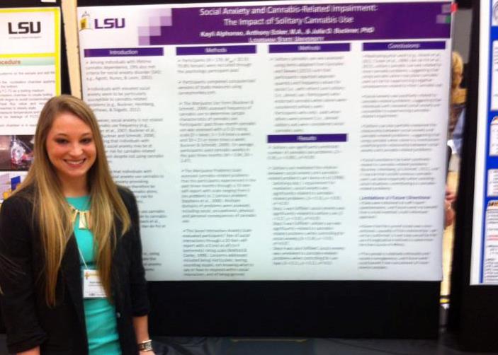 Kayli presenting a poster