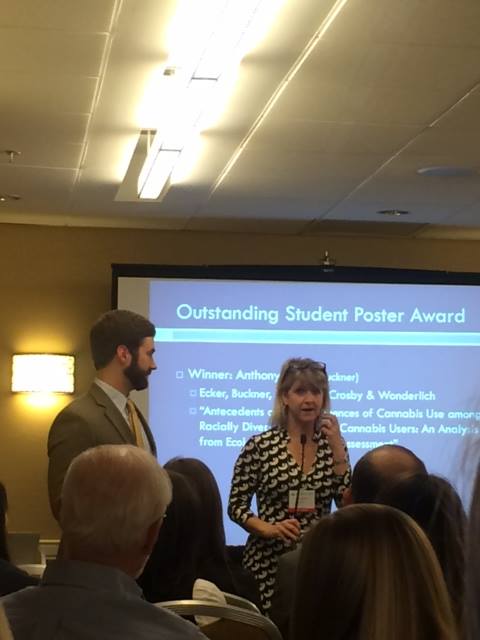 Graduate student Tony Ecker receiving the 2014 ‪ABCT Addictive Behaviors SIG Outstanding Poster Award.