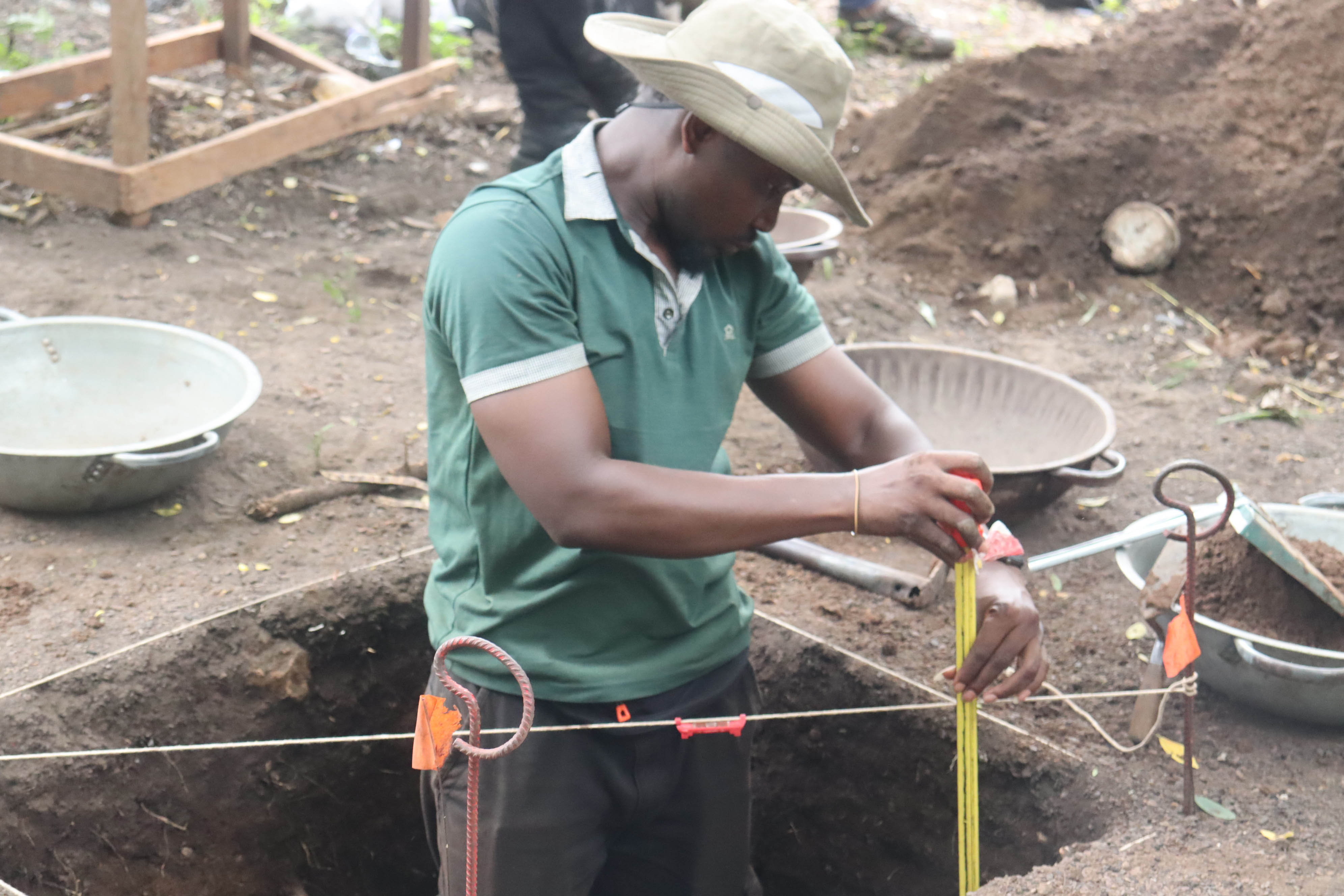 Kelvin Asare taking a measurement