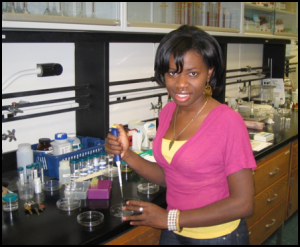 Glenys C. holding micropipette over petri dish