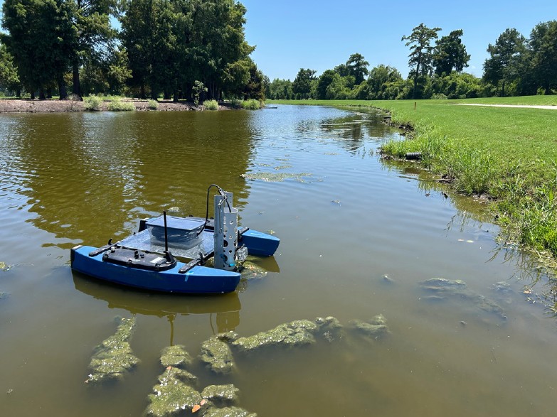 blueboat in golf course pond
