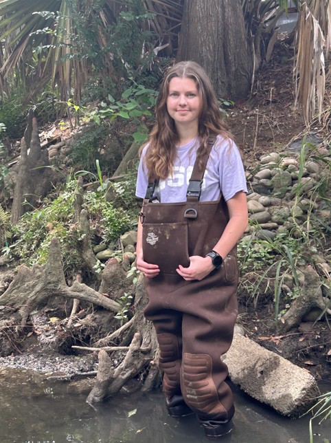 Hadley standing in the field 