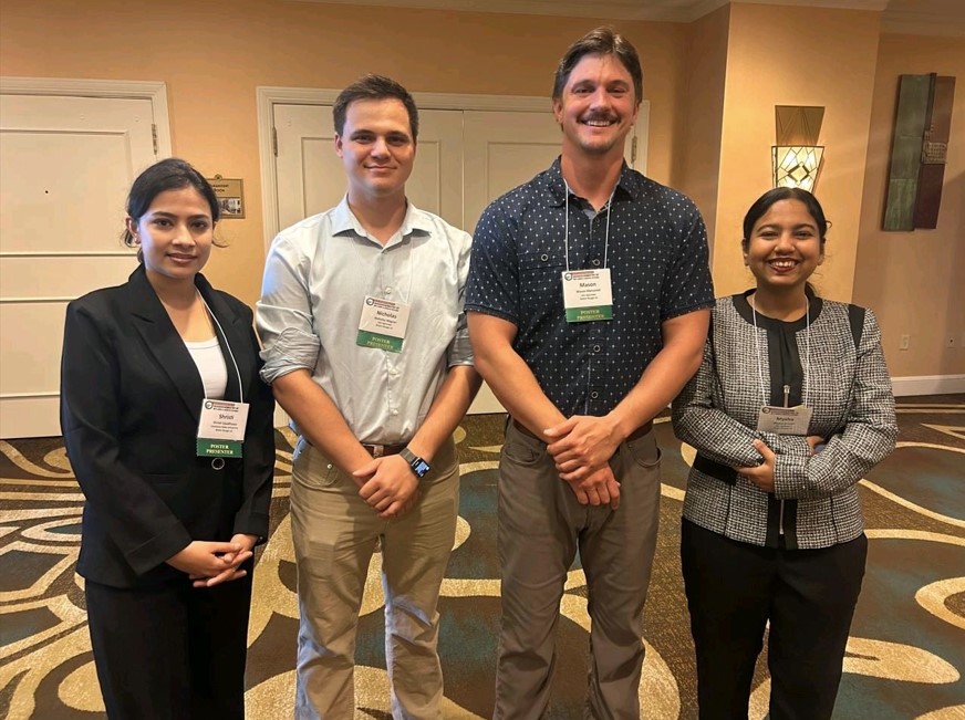 team picture at the conference