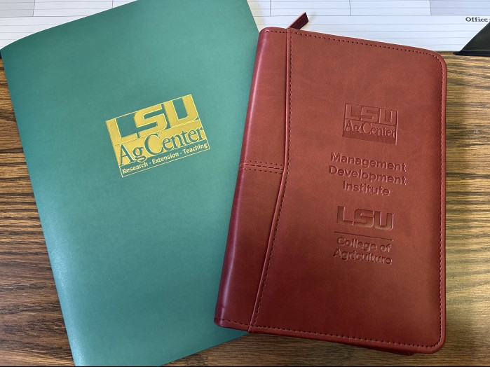 note book and logo for programs