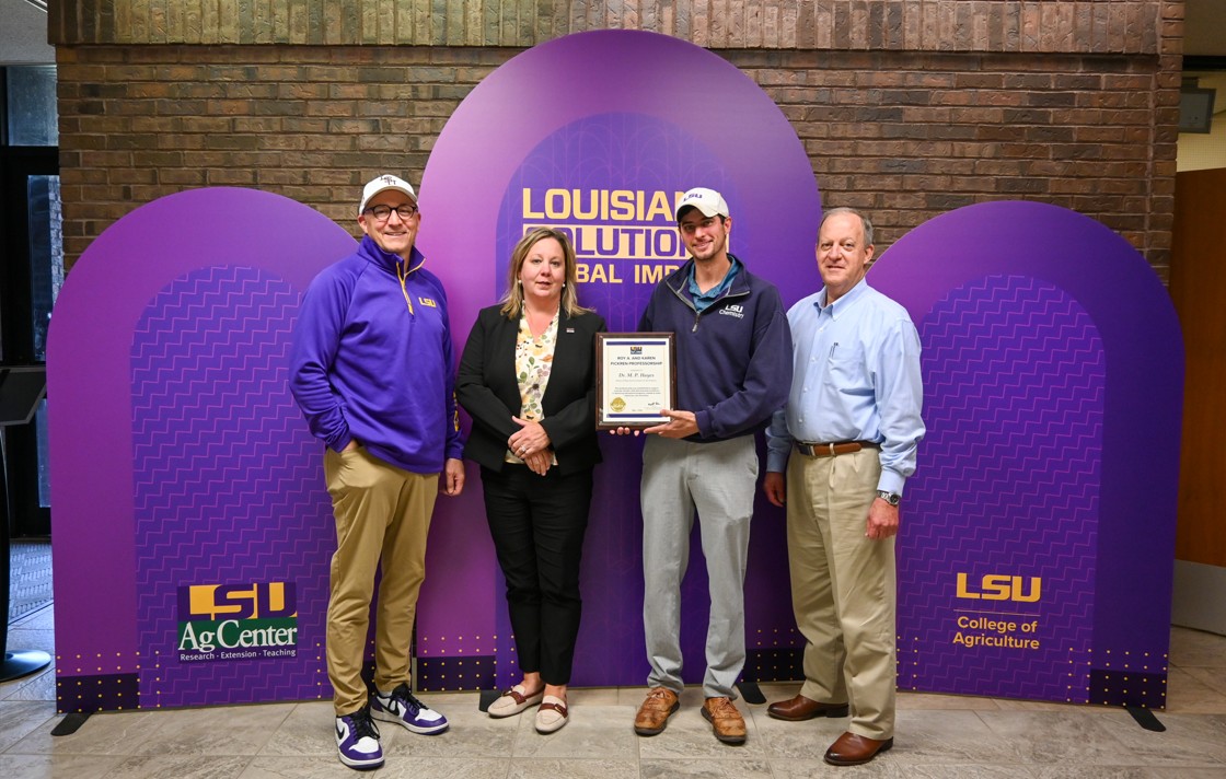 MP Hayes accepting an award from LSU AgCenter Admin