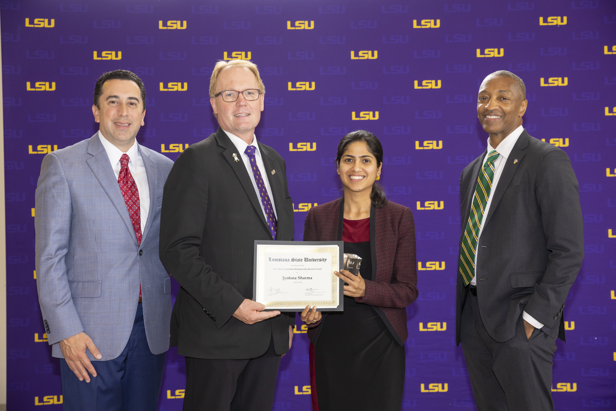 Dr. Sharma receiving LSU Alumni Association Rising Faculty Research Award