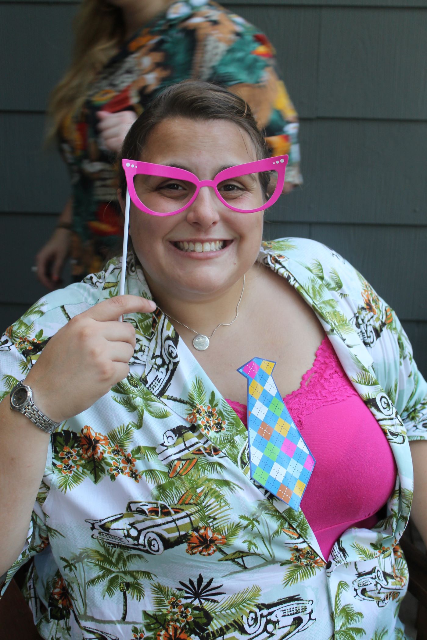 Danielle at summer party with pink glasses