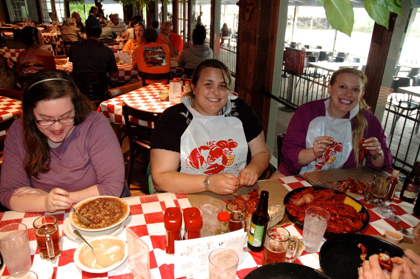Julie, Danielle, and friends enjoing crawfish