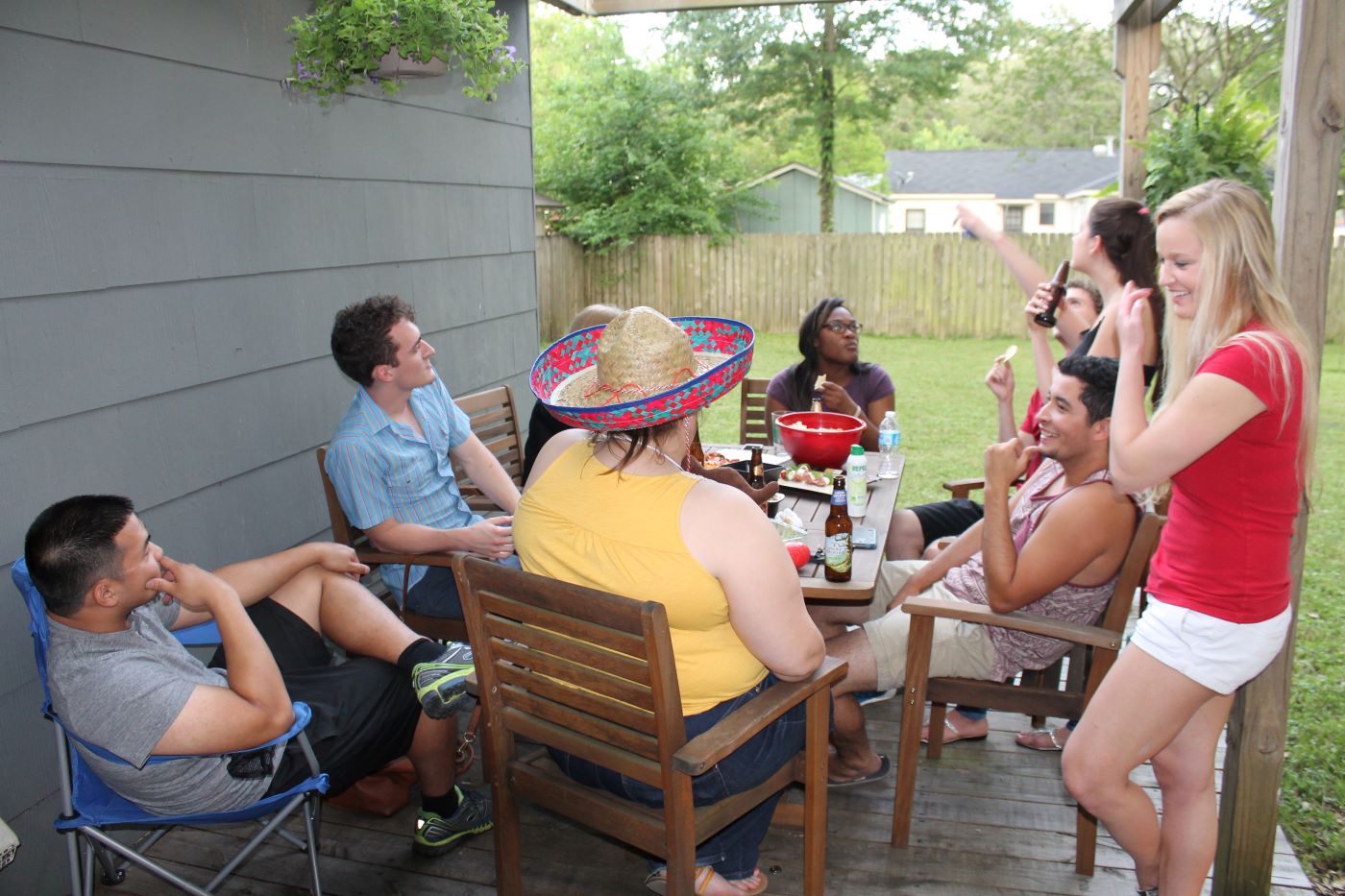 maruska lab members sitting around an outdoor fiesta table