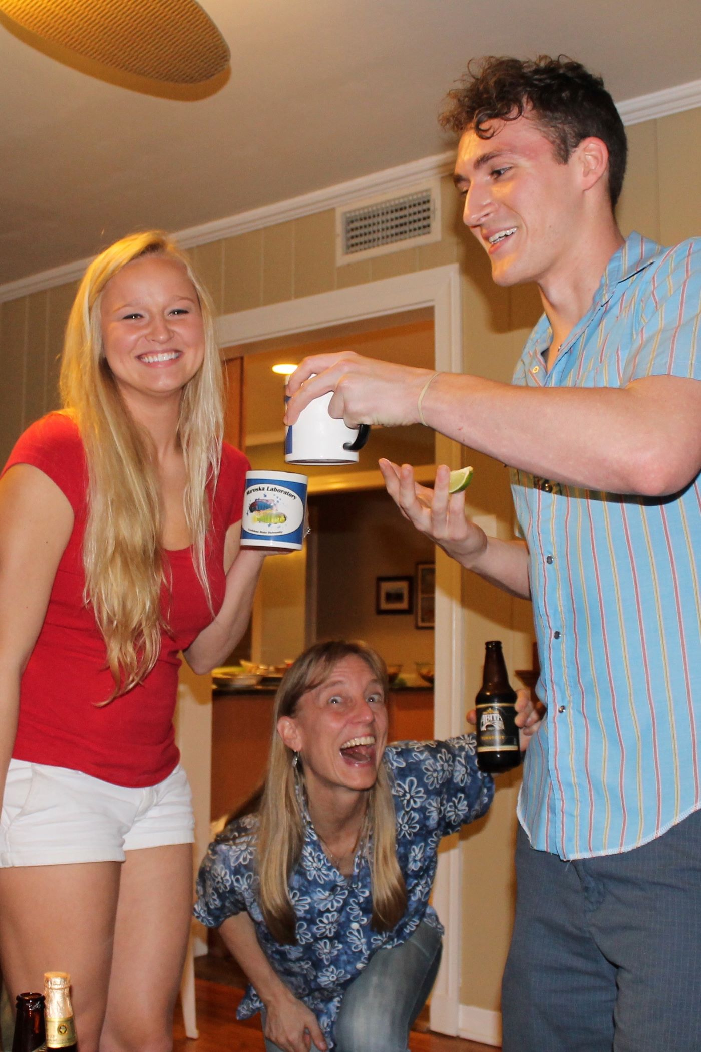 Karen and undergrads enjoy graduation mugs