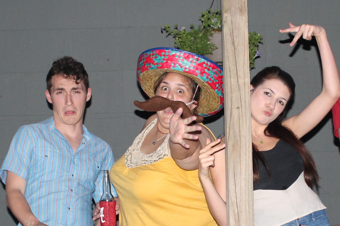Danielle with a sombrero and lab undergrads enjoy the fiesta