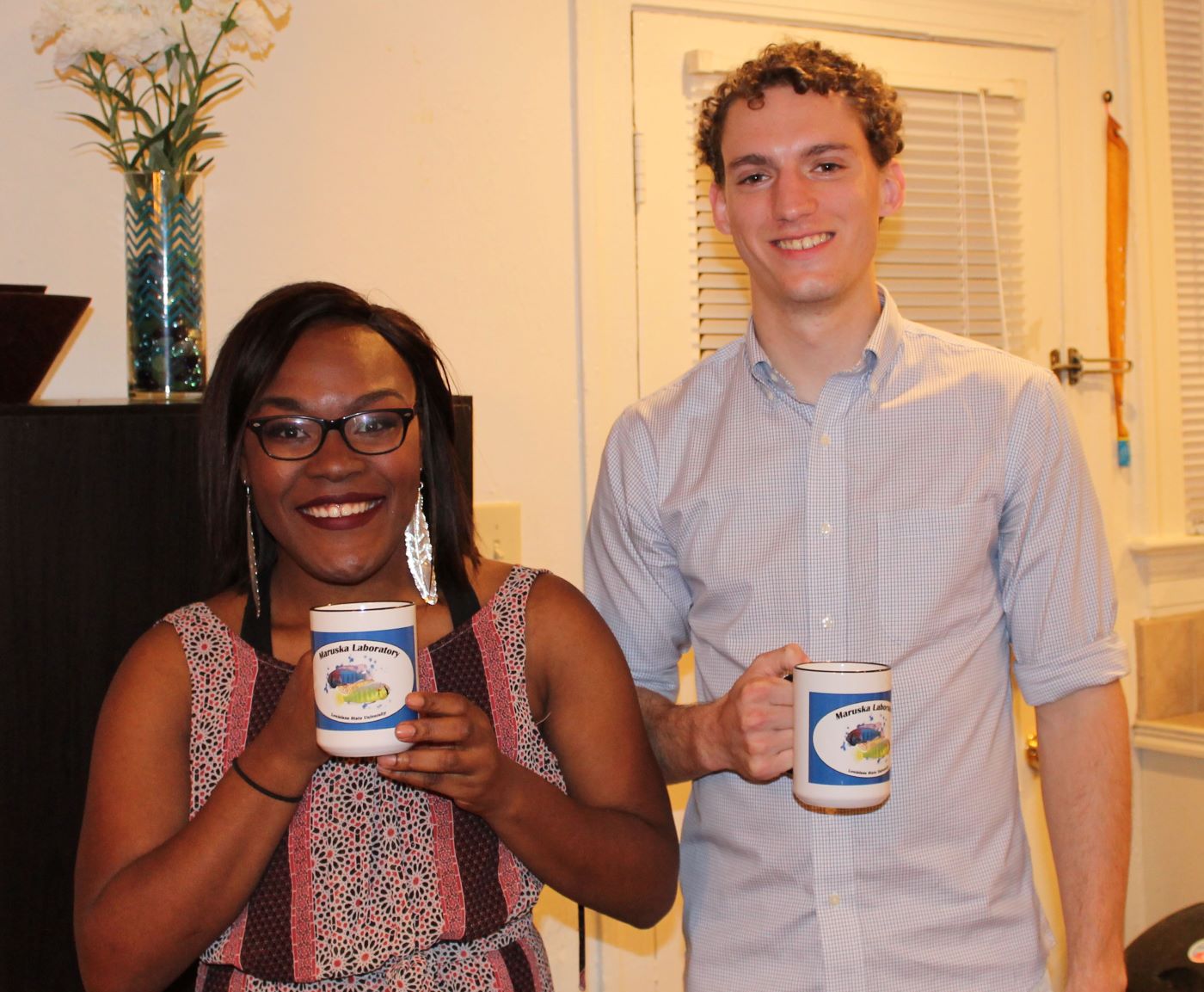 Polly and Christopher graduate and christen their new mugs