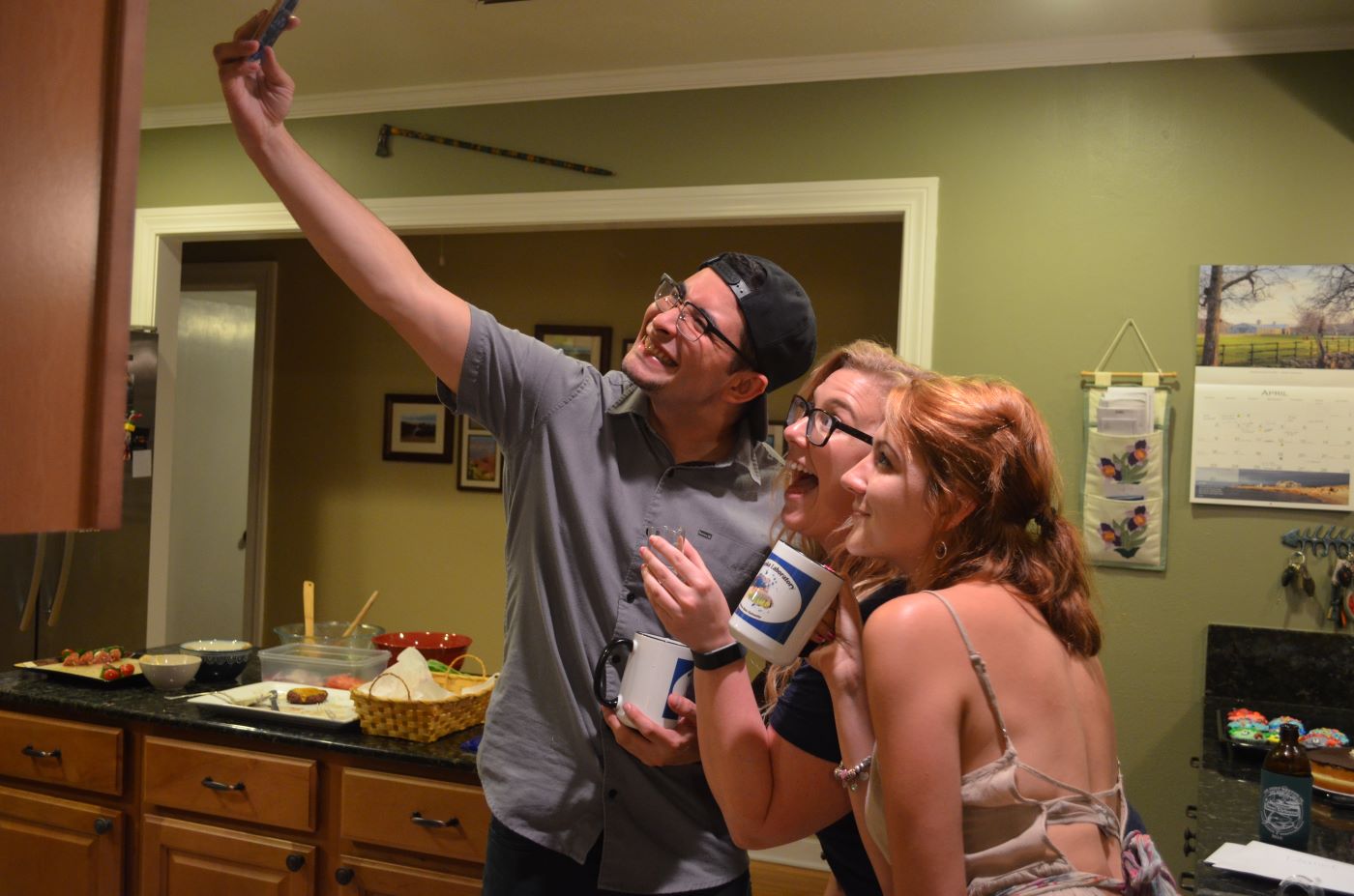 Daniel, Karen Jr., and Kara talking a selfie
