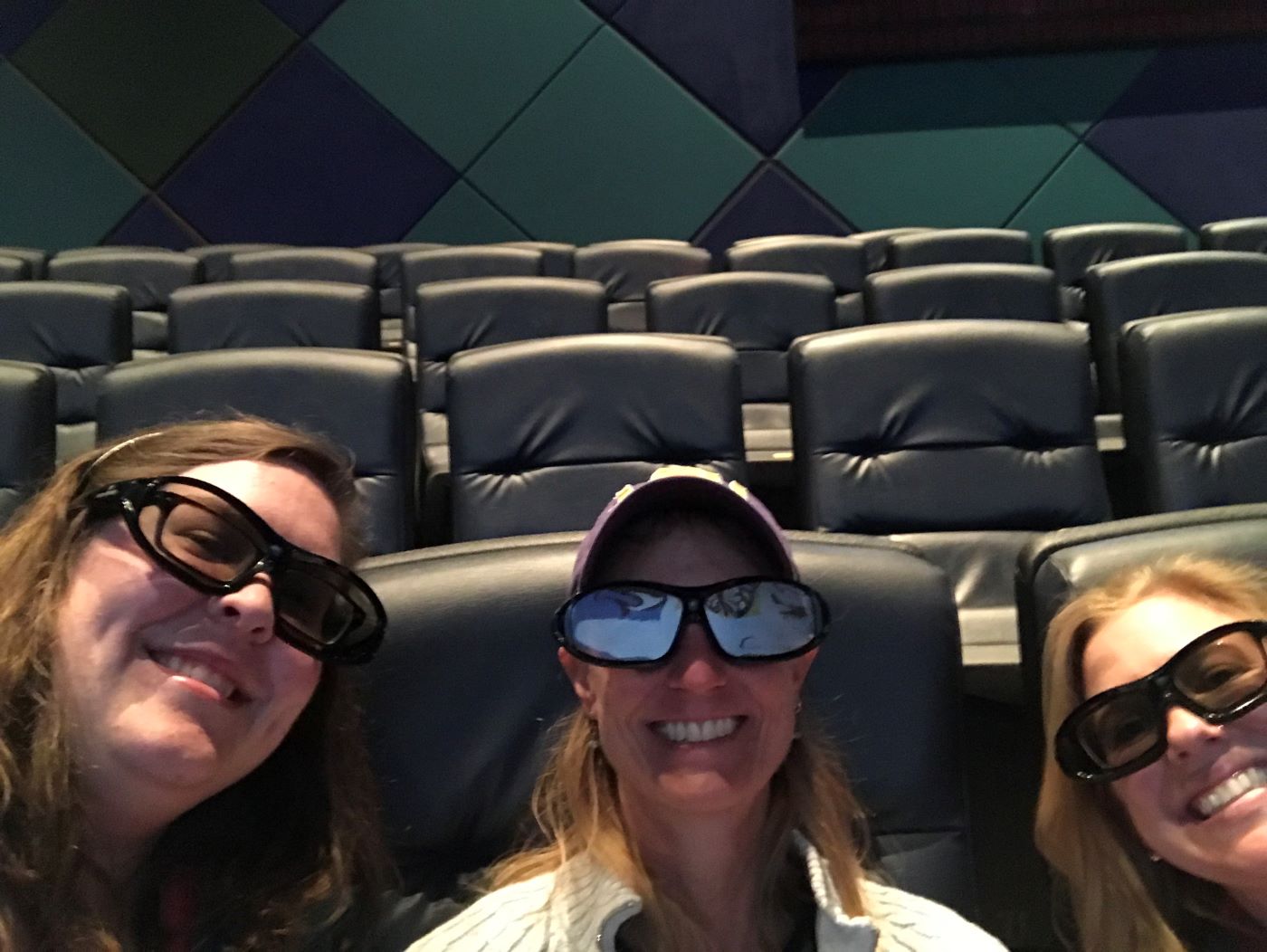 Karen, Karen Jr., and Julie in a movie theater