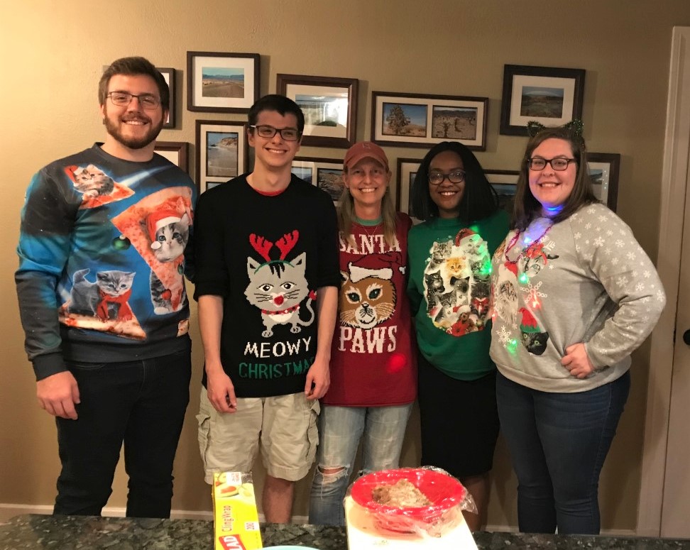 lab members with cat sweaters