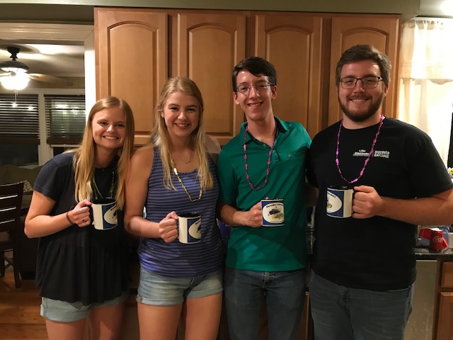 undergrads with mugs