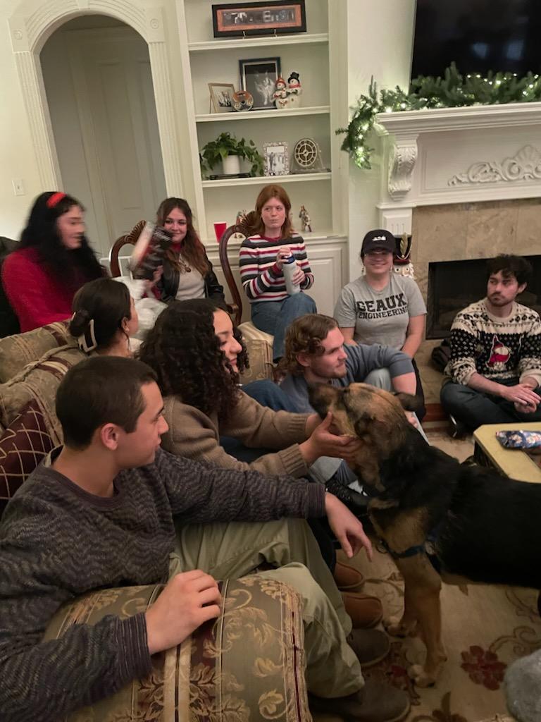 Shot of team members enjoying White Elephant game.