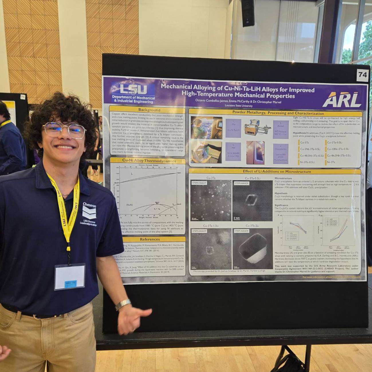 Octavio in front of his poster for LSU Discover Day.