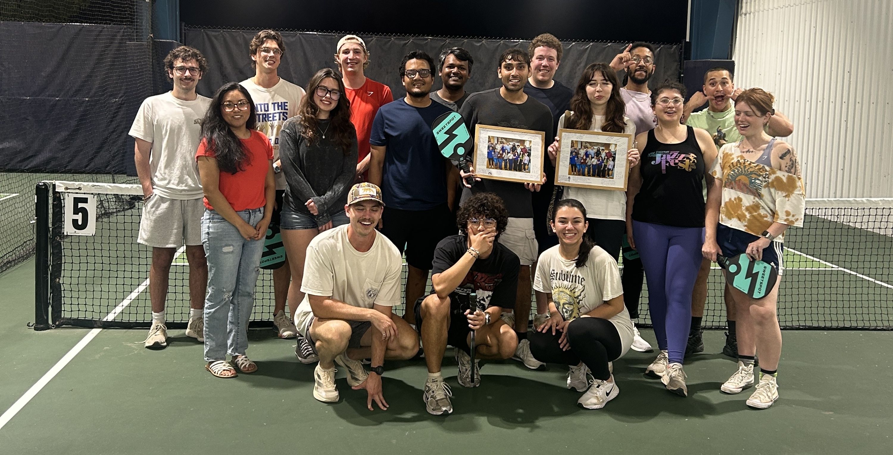Group photo at pickleball venue.
