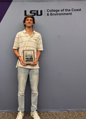Lee with award