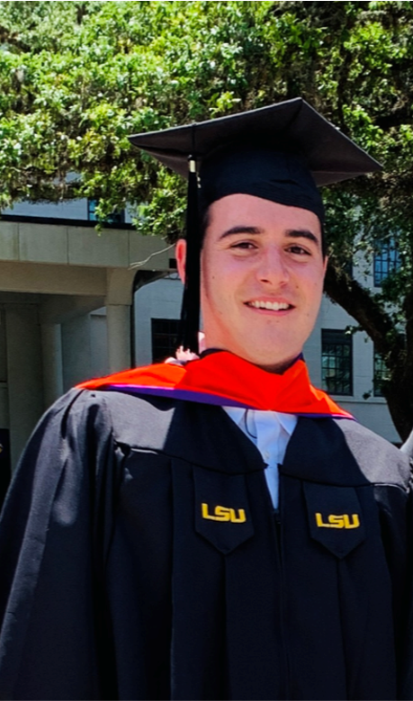 a man in a grad cap and gown