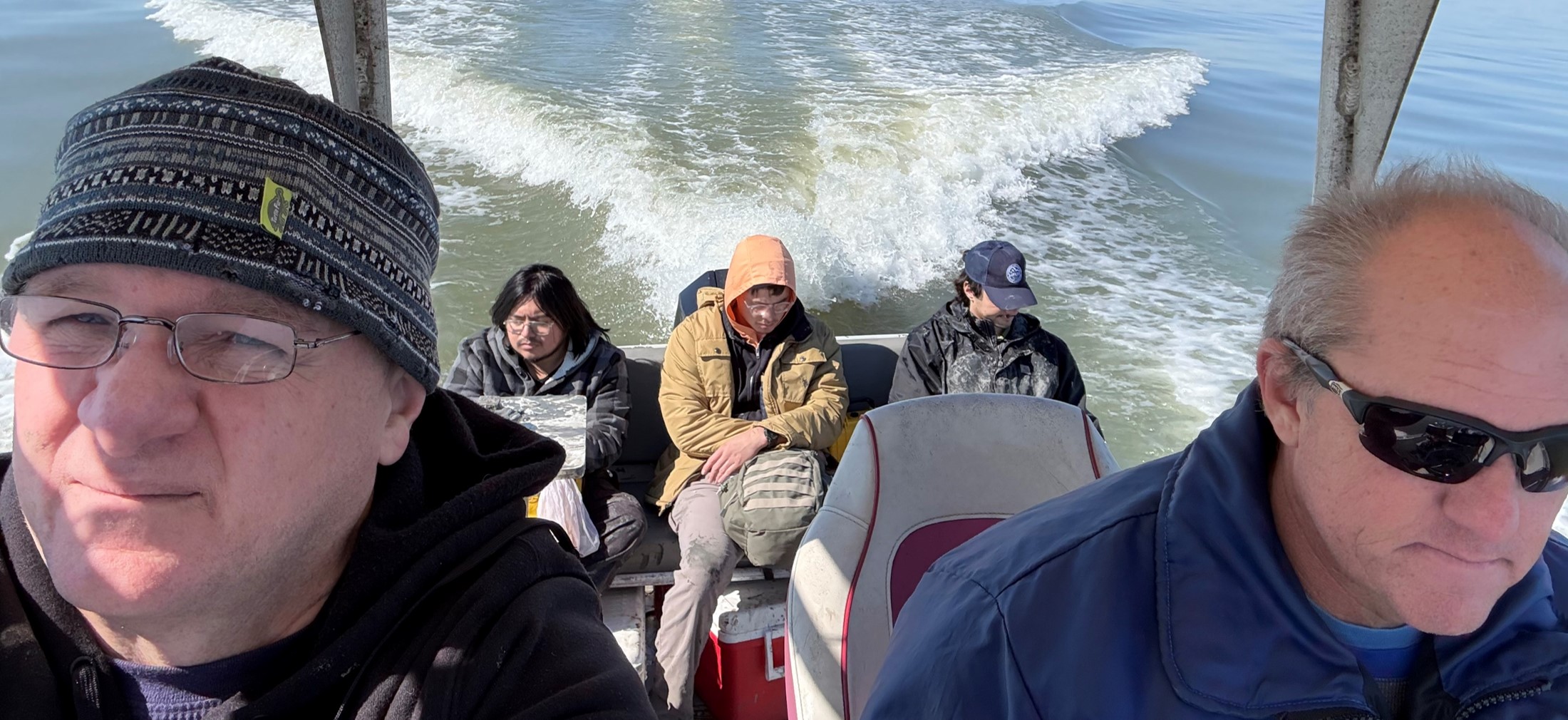 four people on boat